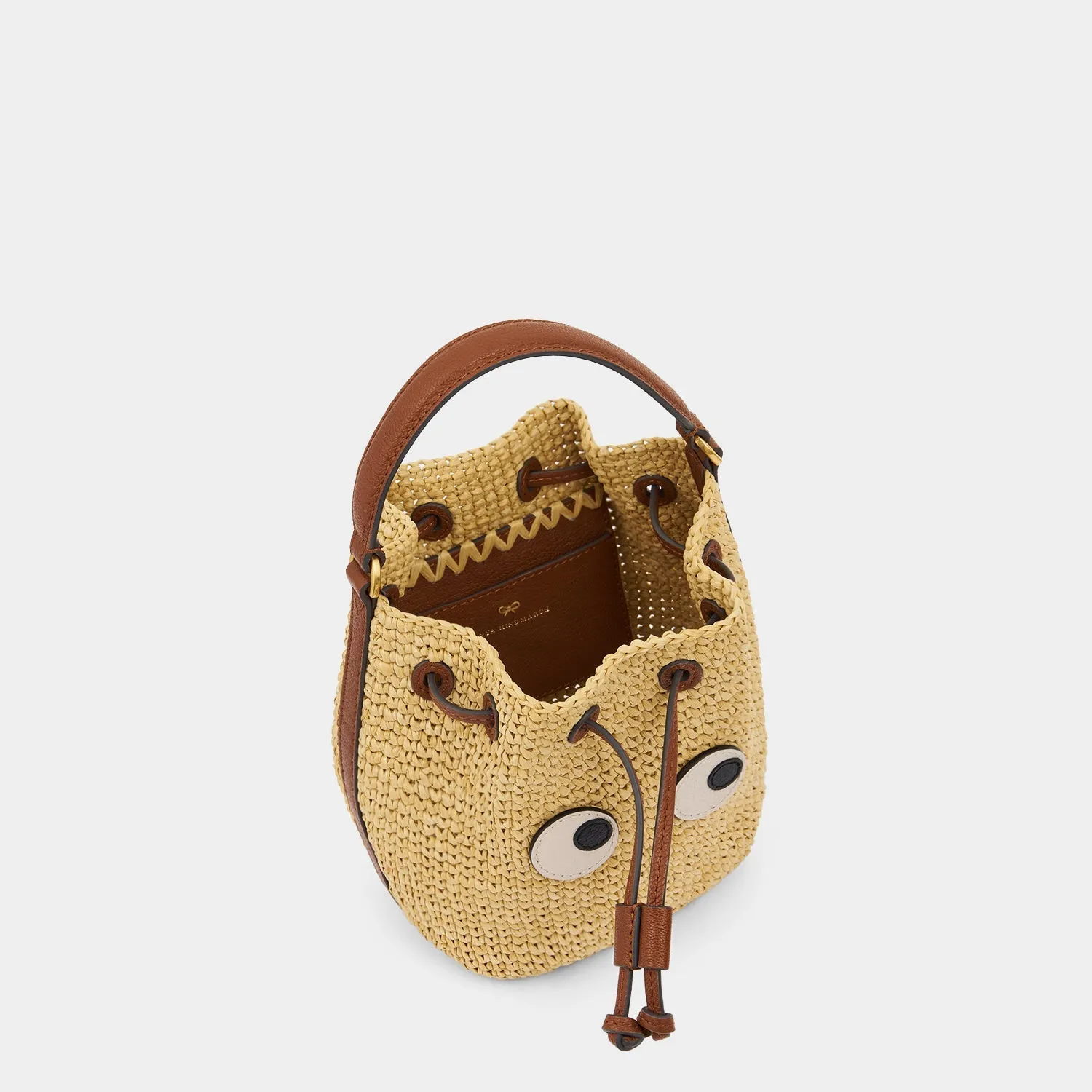 Raffia Eyes Drawstring Cross-body